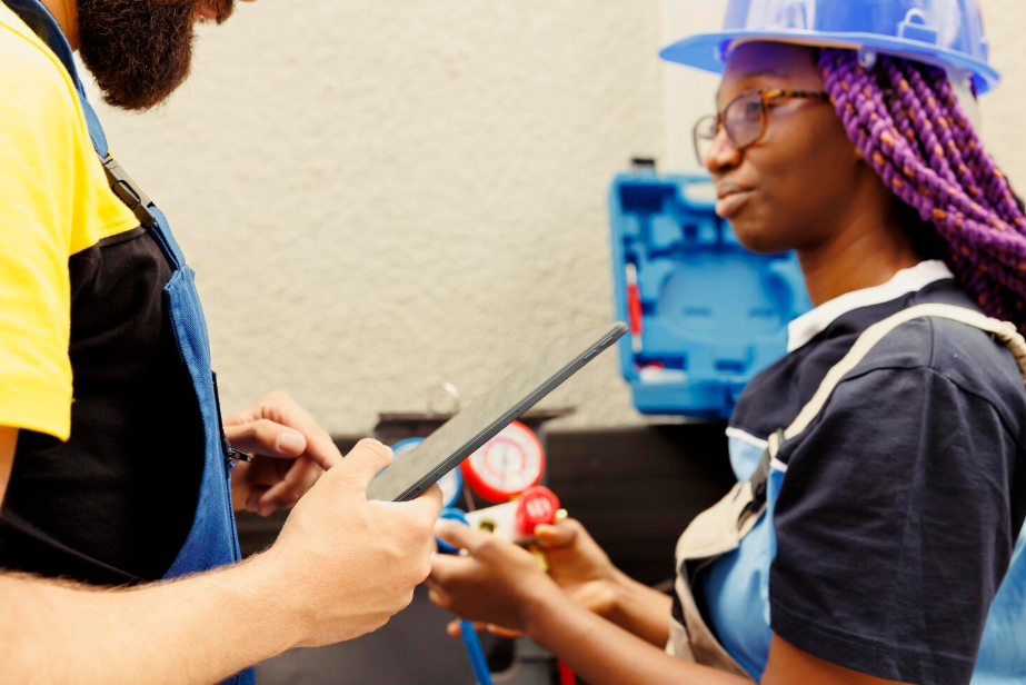 Technician calibrating transmitter